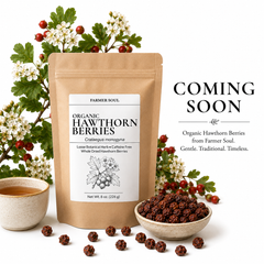 A stand-up pouch labeled Farmer Soul Organic Hawthorn Berries stands on a white background with decorative hawthorn branches, a small bowl of dried berries, a cup of tea, and large 'COMING SOON' text on the right.