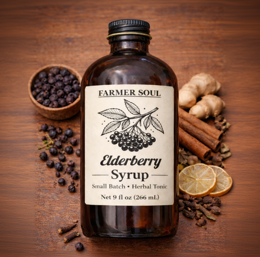 Bottle of Farmer Soul Elderberry Syrup on a wooden surface with ingredients.